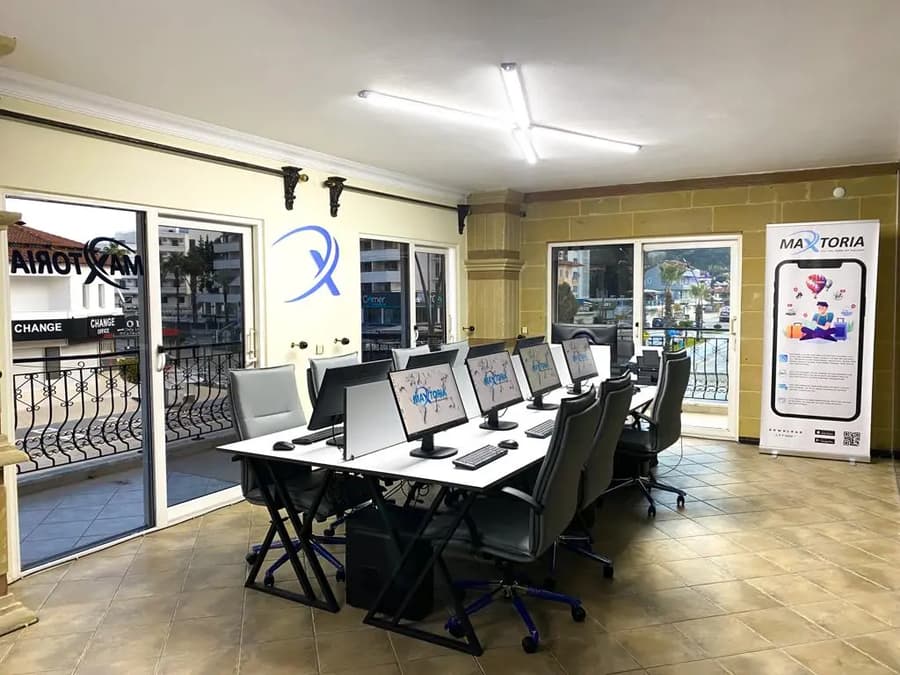 The Maxtoria office in Manavgat, Antalya, with the company logo on the wall